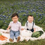 Photo of boys with bunny in flowers